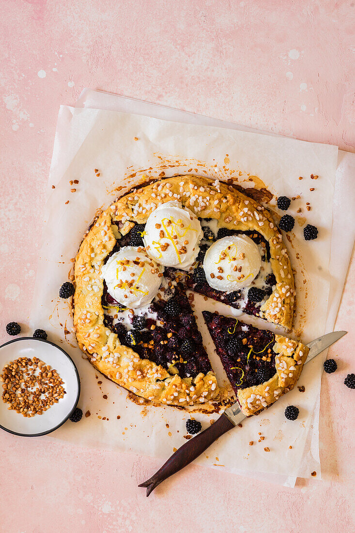 Blackberry Galette with Peanut Croquant, Decorated with Pearl Sugar, Served with Vanilla Ice Cream