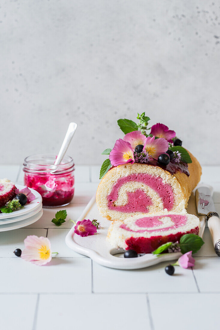 Sponge cake roll with black currant mousse