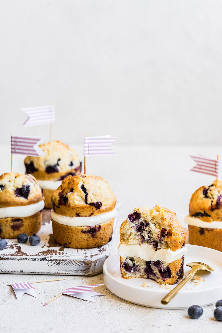 Blueberry cupcakes with a layer of cream cheese