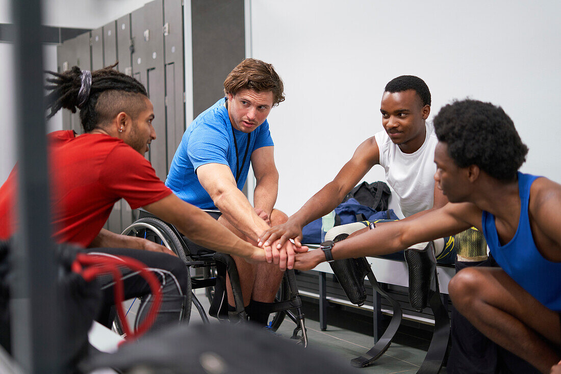Amputee and wheelchair athletes in locker room