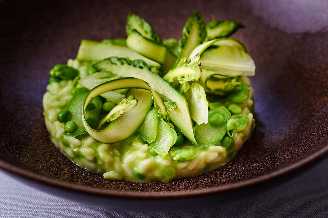 Risotto with green peas, asparagus and broad beans