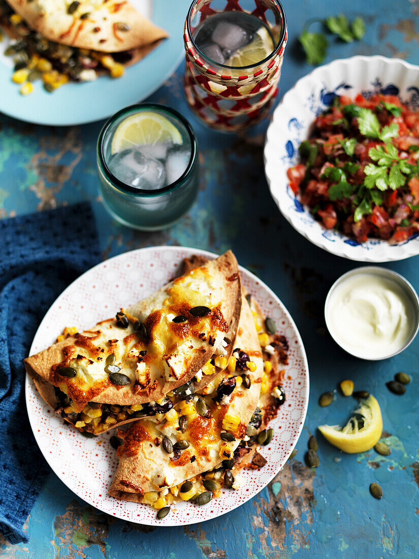 Corn and kidney bean quesadillas with tomato salsa