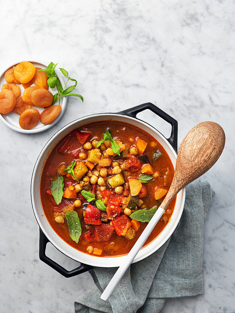 Vegan tagine with vegetables, mint, chickpeas, apricots