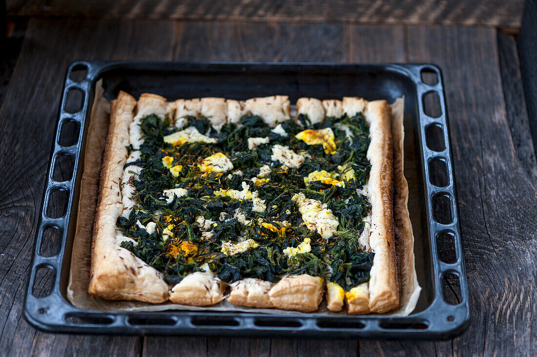 Spinach tart with cheese and turmeric