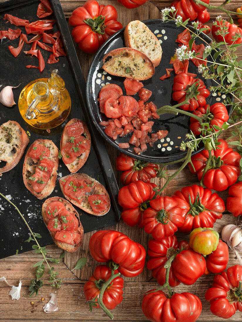 Still life with bruschetta and fresh beef tomatoes