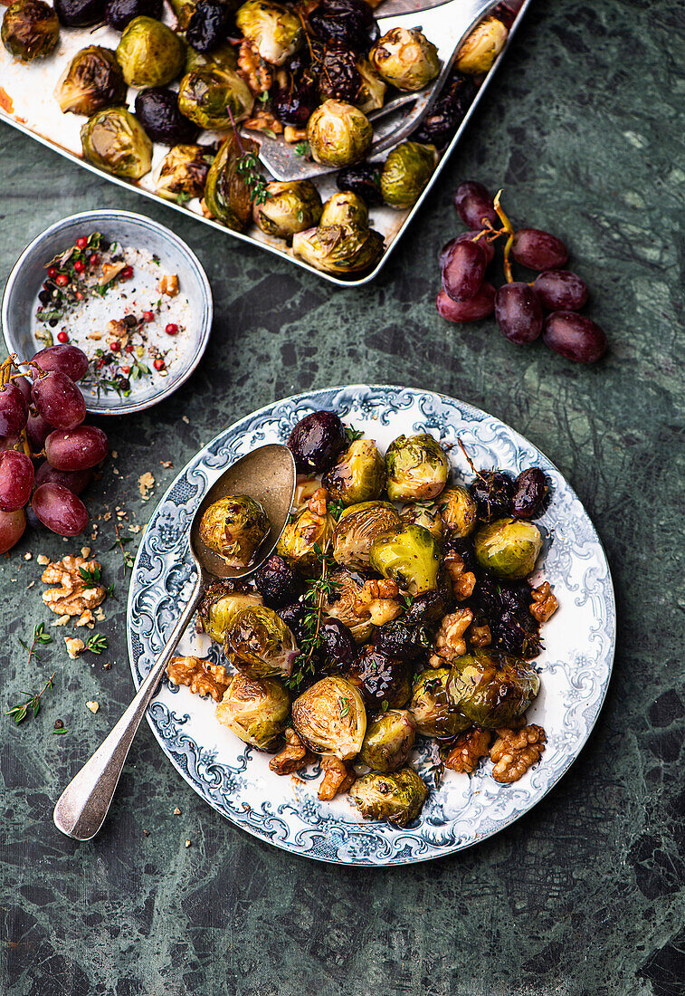 Baked Brussels sprouts with grapes and walnuts