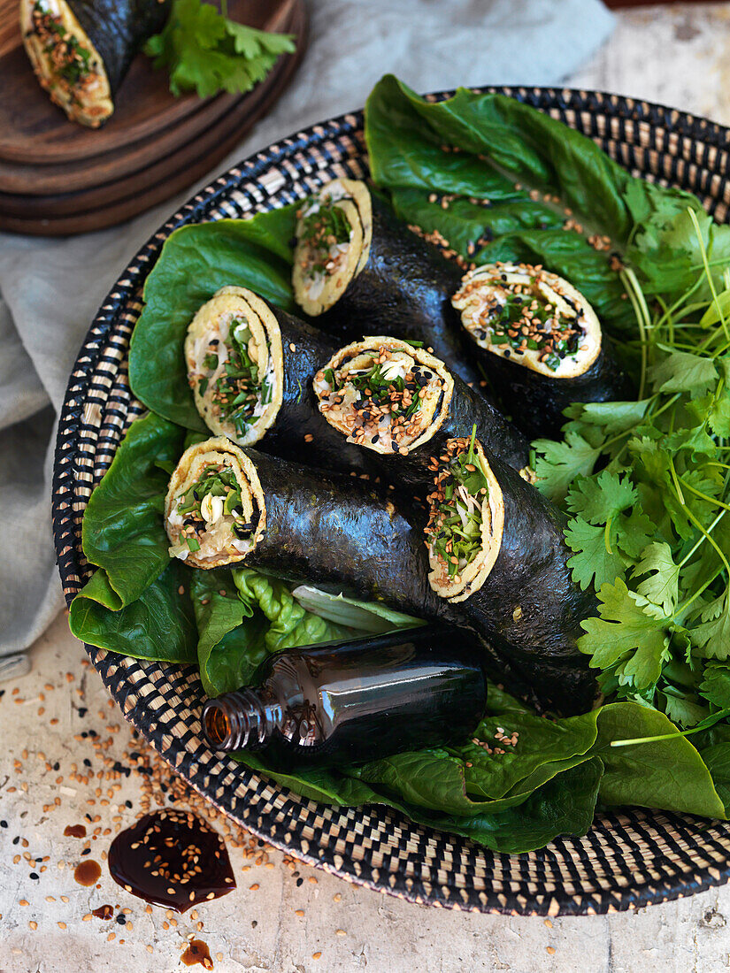 Rolls with egg, nori, greens, sesamyseeds and coriander