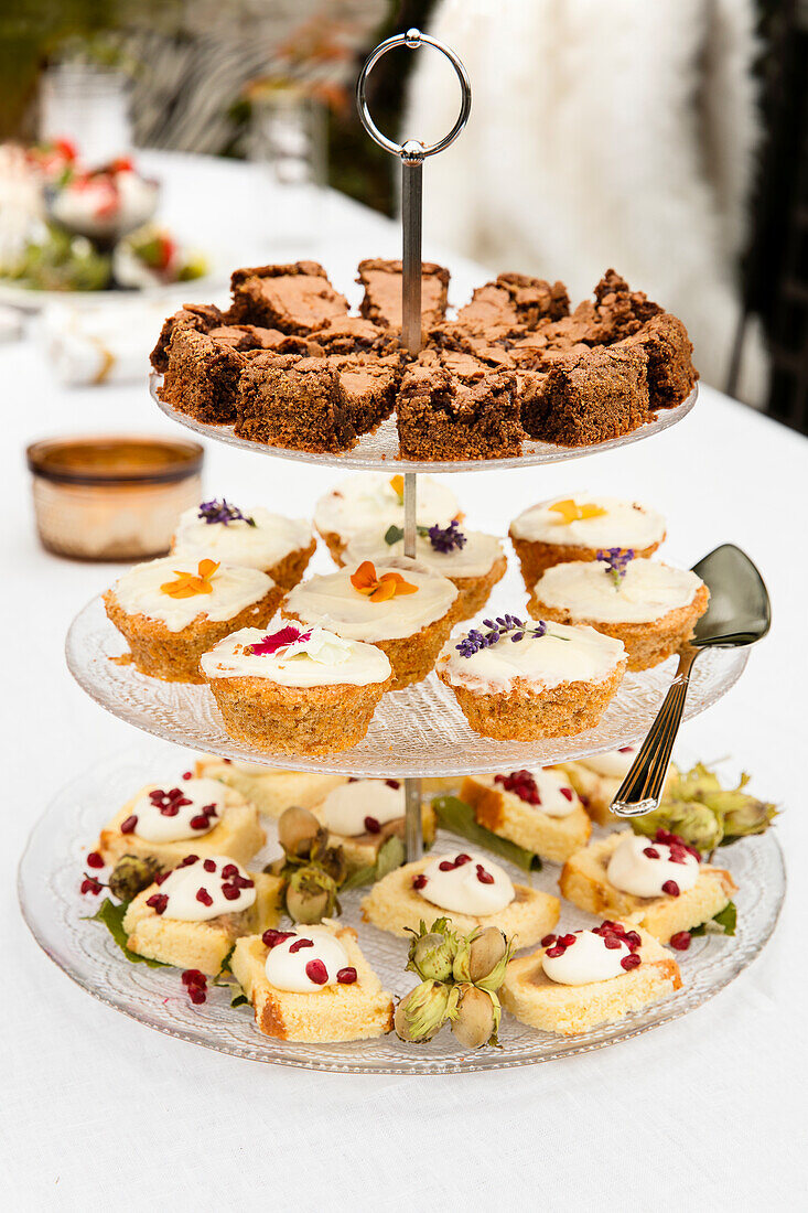 Various biscuits on a tiered dessert stand