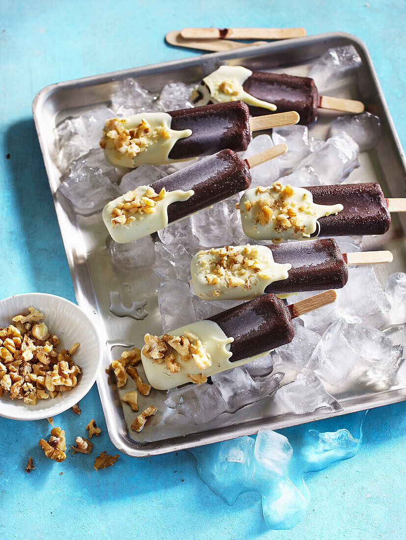 Coconut ice lolly with nuts