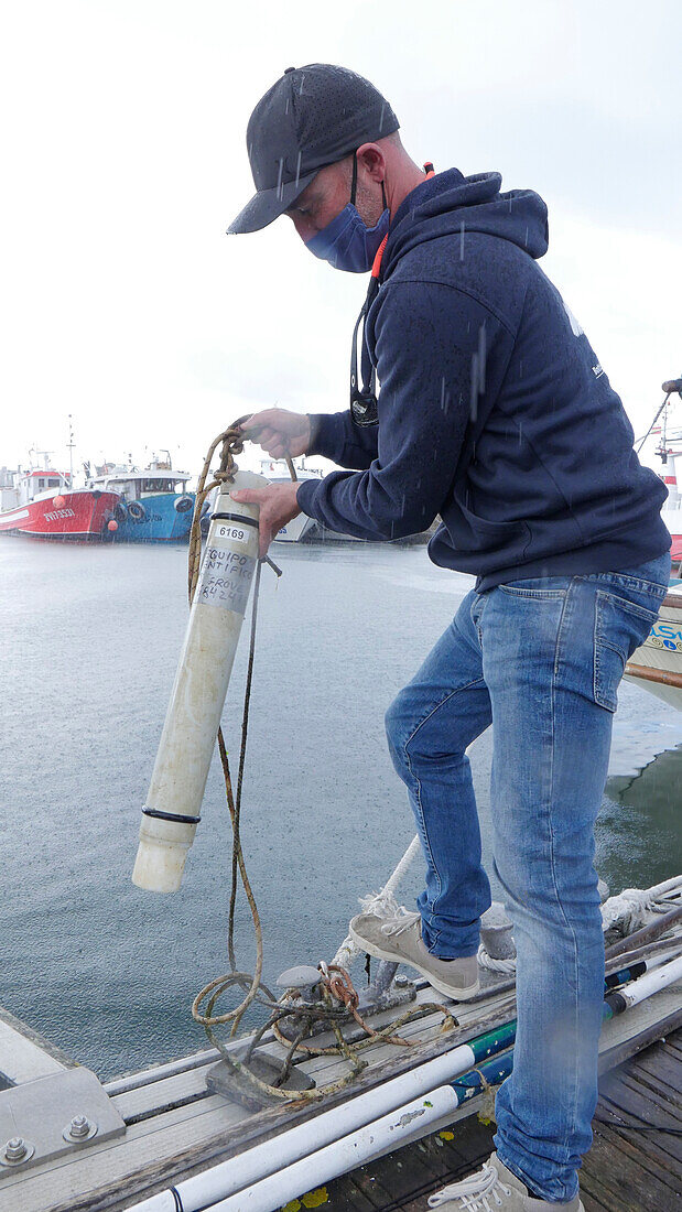 Researcher capturing sounds of dolphins