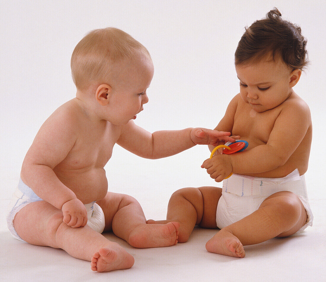 Two babies playing