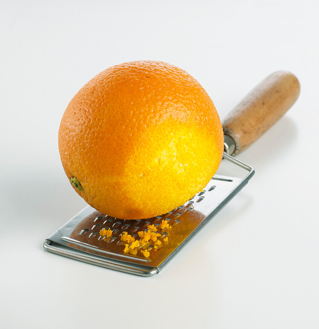 Grating an orange