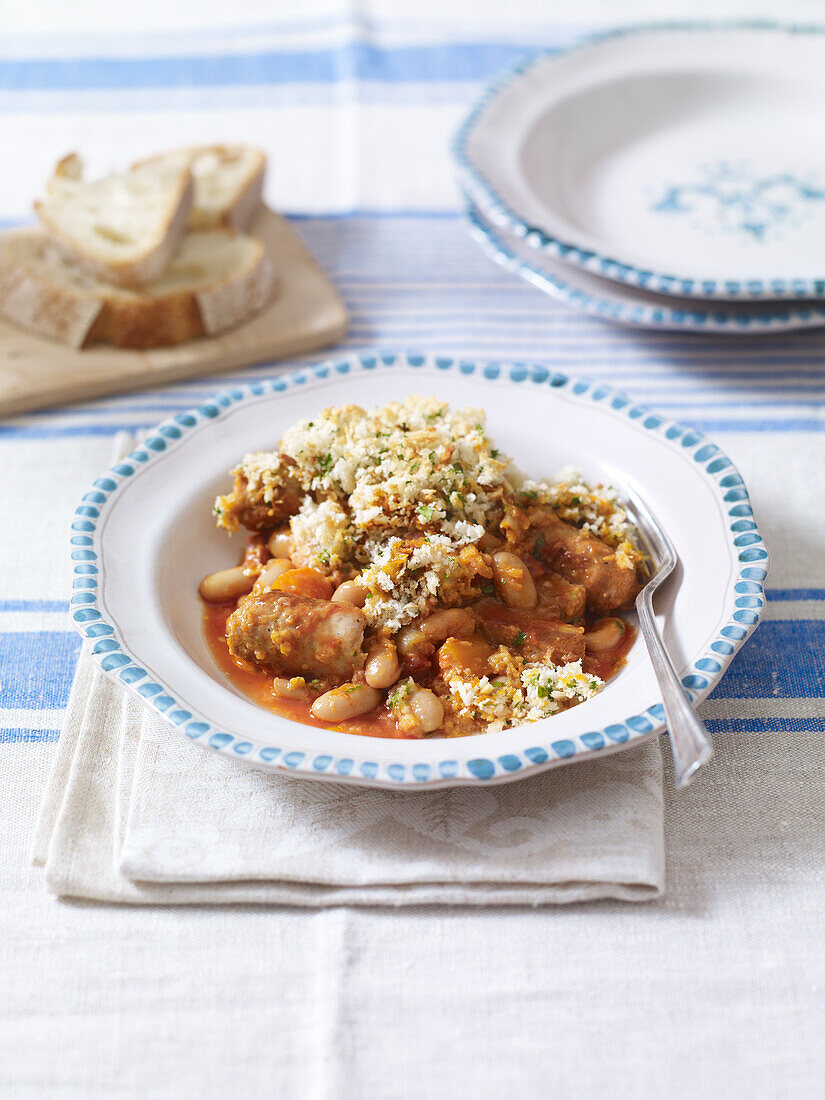 Sausage and bean cassoulet and breadcrumb top