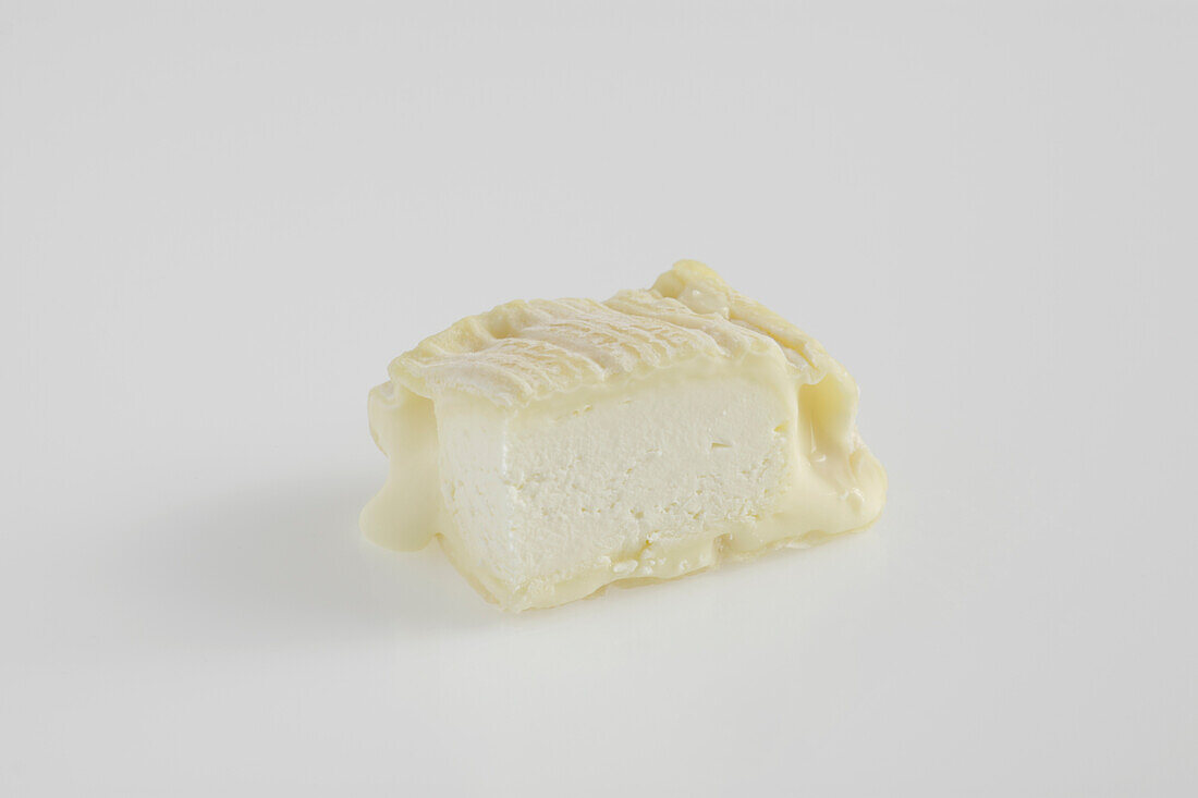 Slice of French Lingot de la Ginestarie ewe's milk cheese