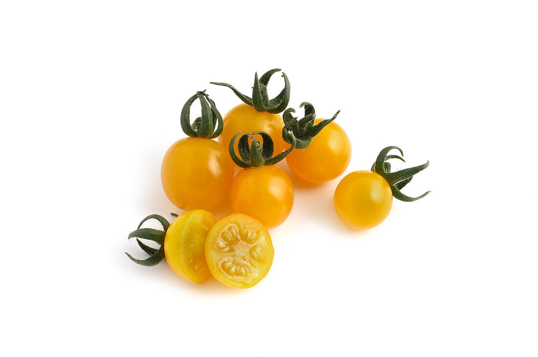 Whole and sliced 'Broad Ripple Yellow Currant' tomatoes