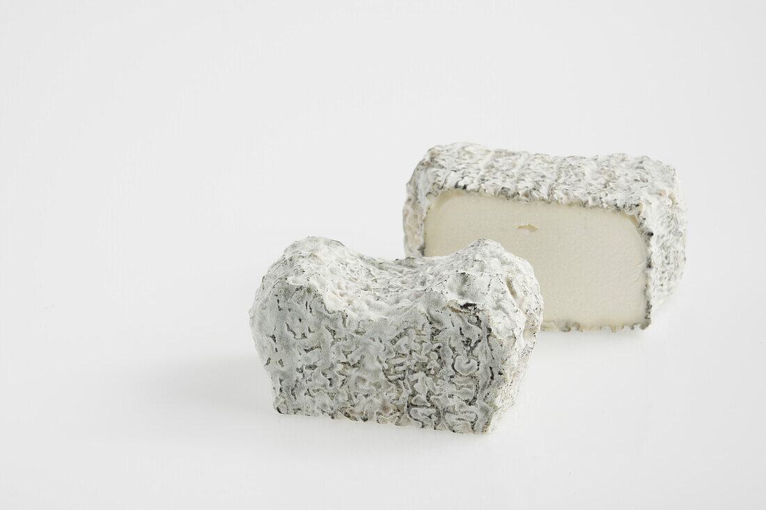 Sliced French Trefle goat's cheese with blue-grey mould
