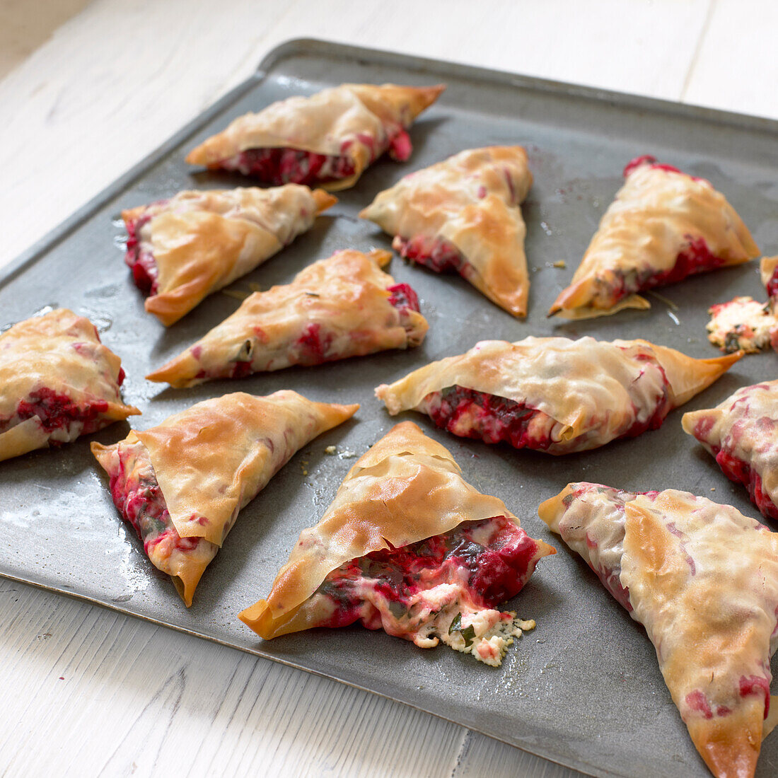 Beetroot and feta in filo pastry on baking tray