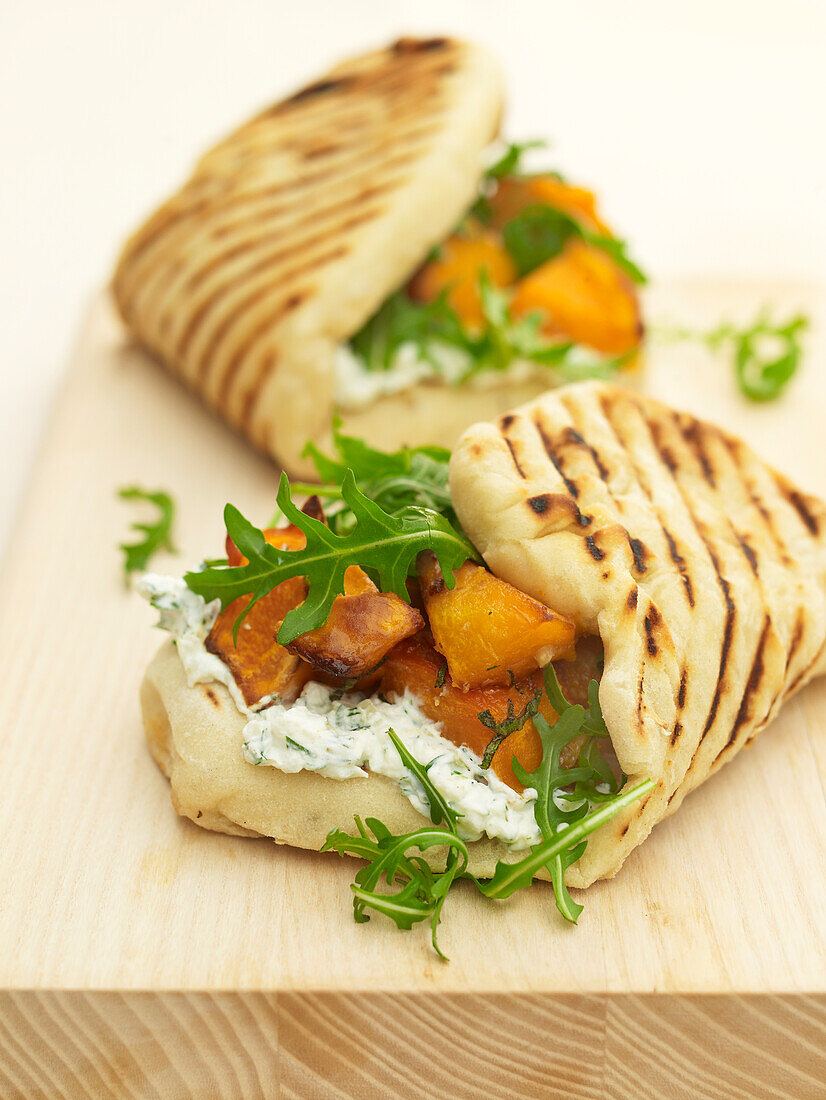 BBQ piadine with roasted pumpkin, rocket and dill ricotta