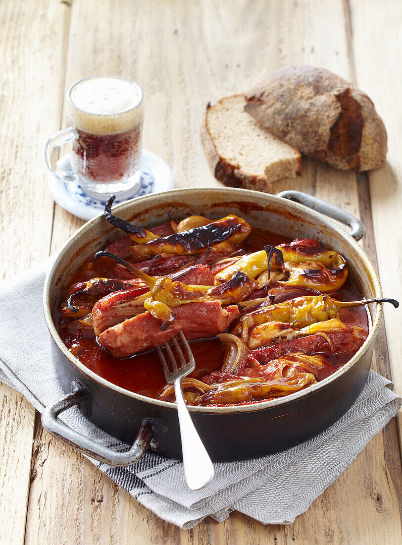 Sausages baked in black beer