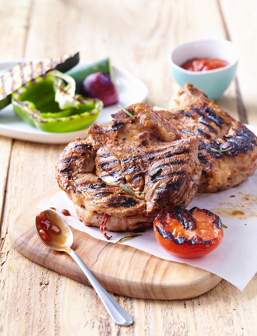 Pork cutlets in beer marinade with vegetable salad