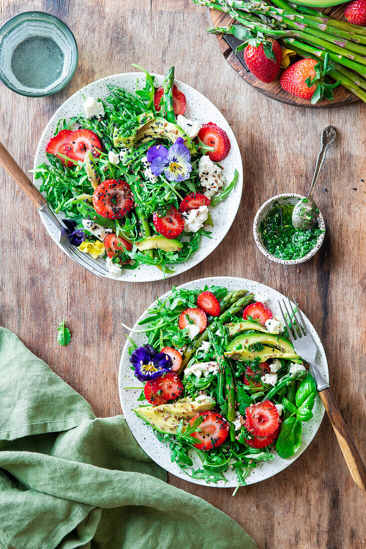 Asparagus salad with avocado and strawberry