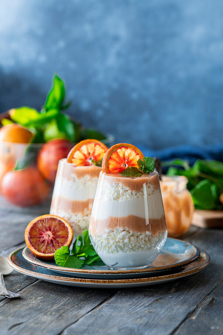 Layered dessert with cream cheese and blood orange curd