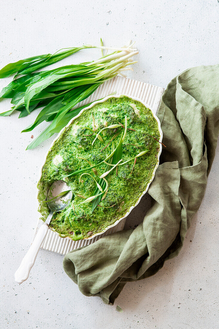 Baked meatballs in wild garlic sauce