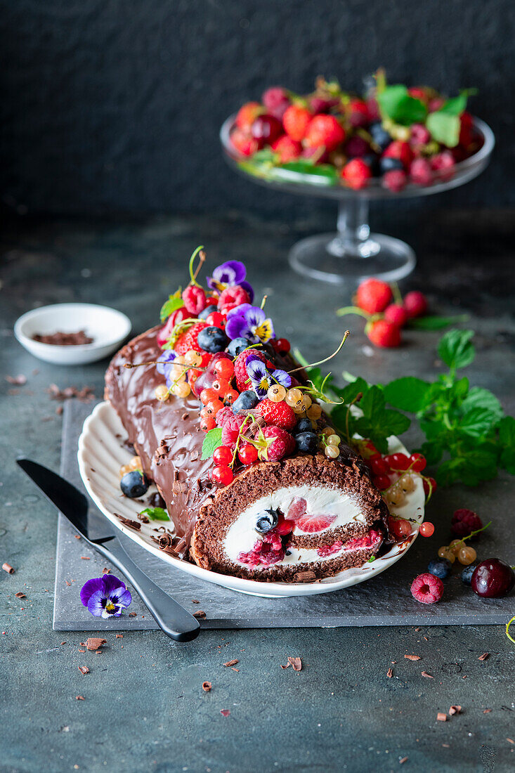 Berry chocolate roll with cream