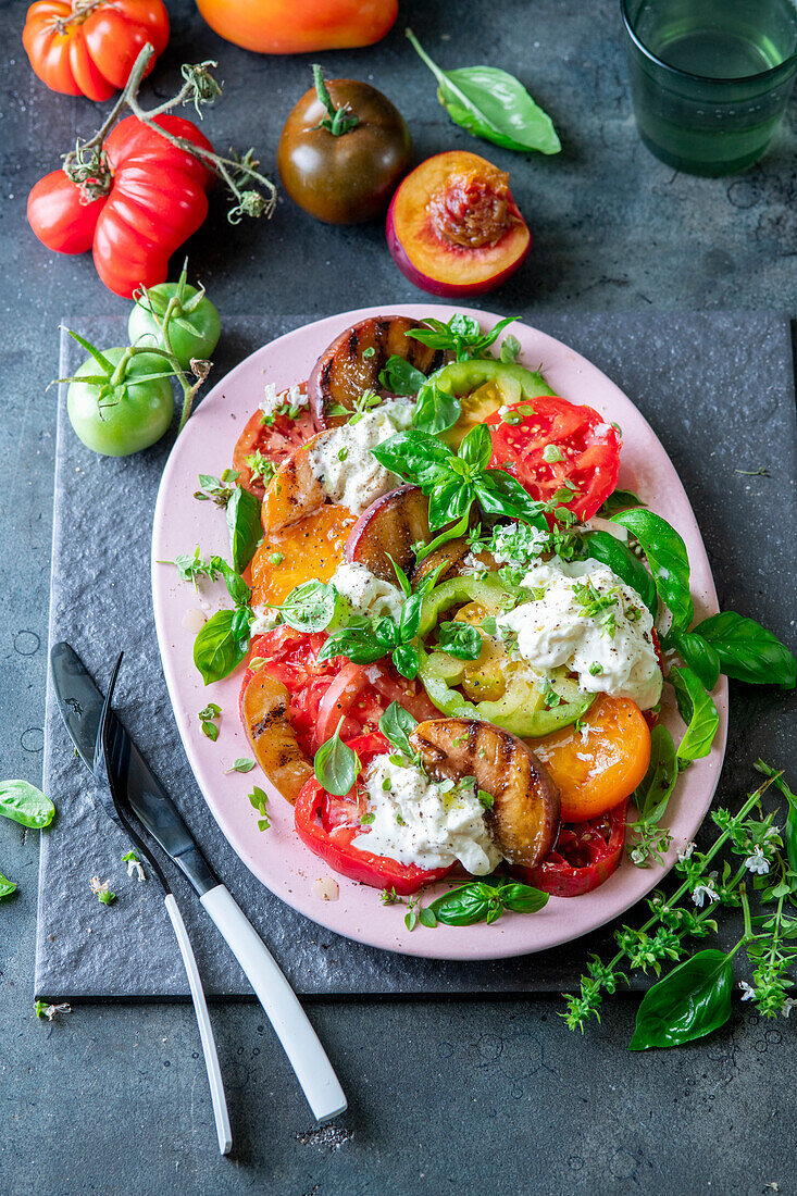 Grilled peach tomato salad with burrata