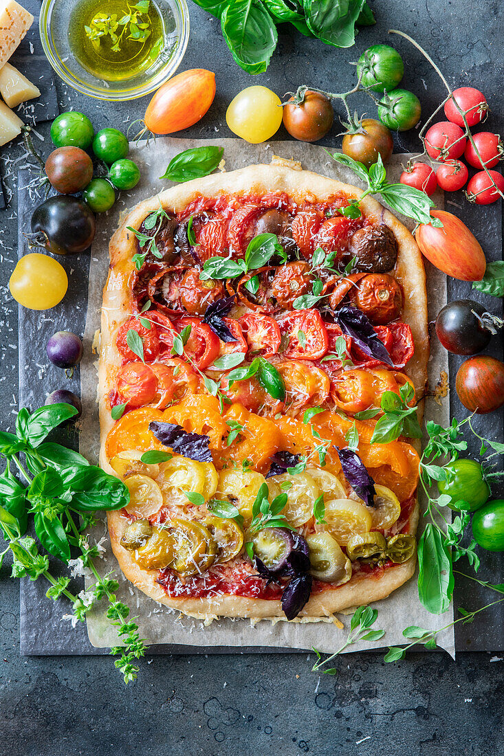 Tomato flatbread with rainbow tomatoes arrangement