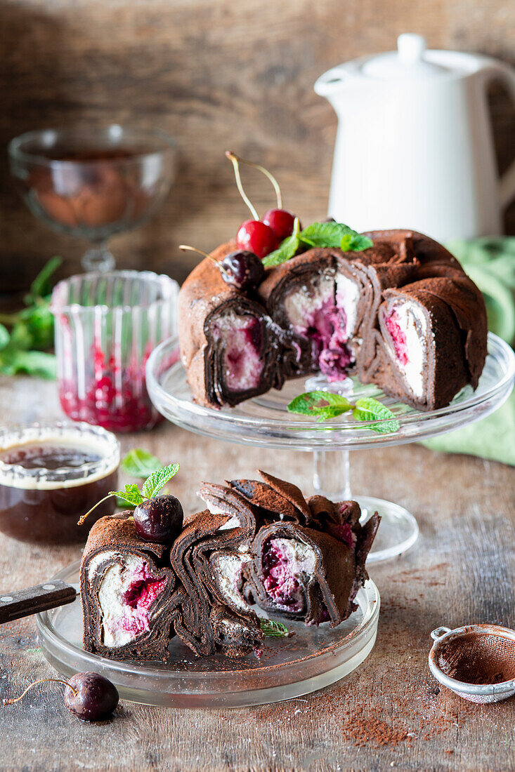 Chocolate crepe cake with cottage cheese and cherries