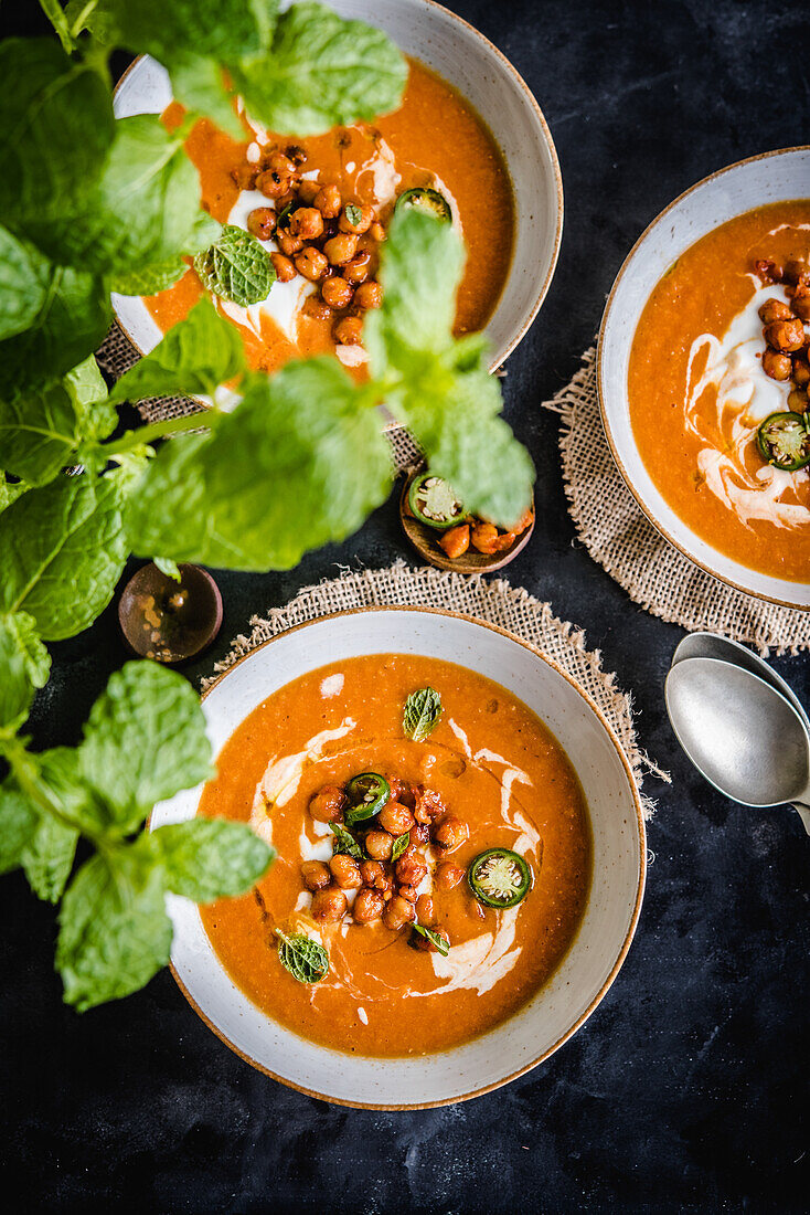 Pumpkin soup with roasted chickpeas and jalapeños