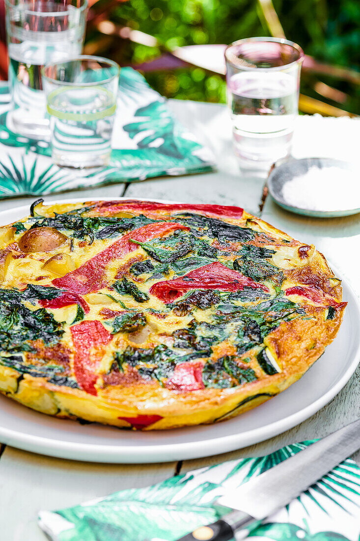 Frittata with bell pepper, spinach and zucchini