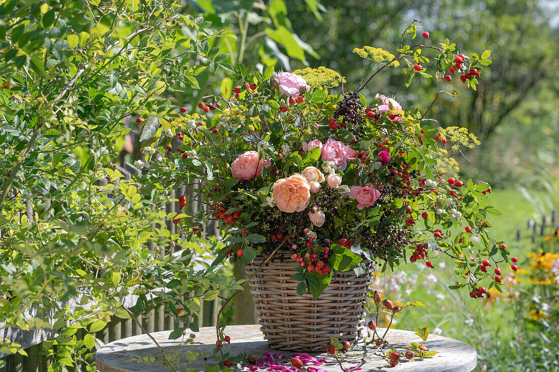 Late summer bouquet of roses, rose hips, fennel blossoms, elderberries, snowball berries and snowberries