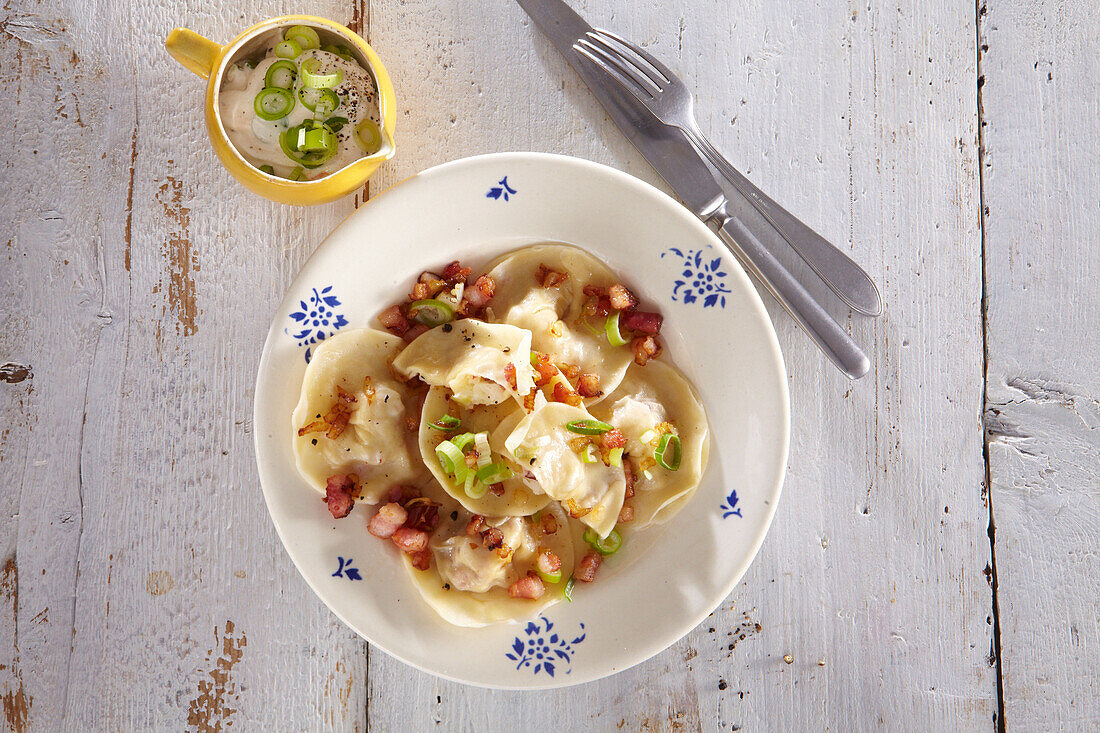 Pelmeni - Russian ravioli with sauerkraut and bacon