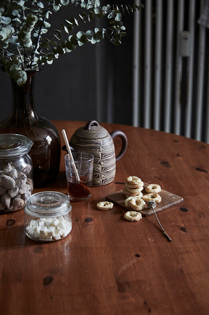 Christmas cookies and candy on a round wooden table