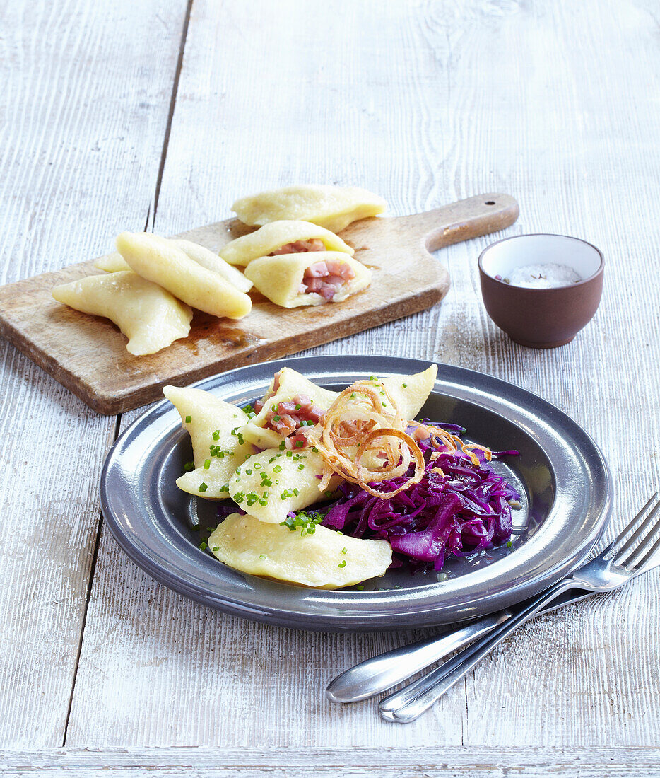 Ravioli with smoked pork served with red cabbage