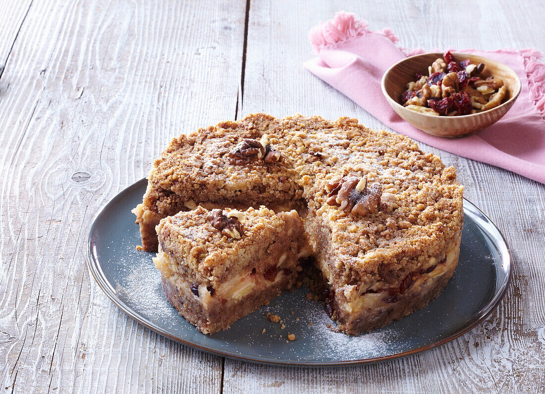 Quick apple cake with nuts and a crumble topping