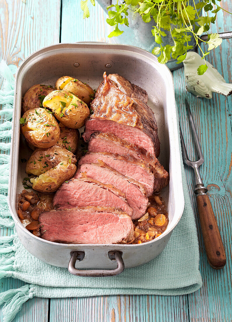 Roast lamb with herb potatoes