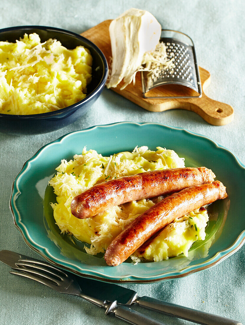 Homemade sausage with horseradish potato mash
