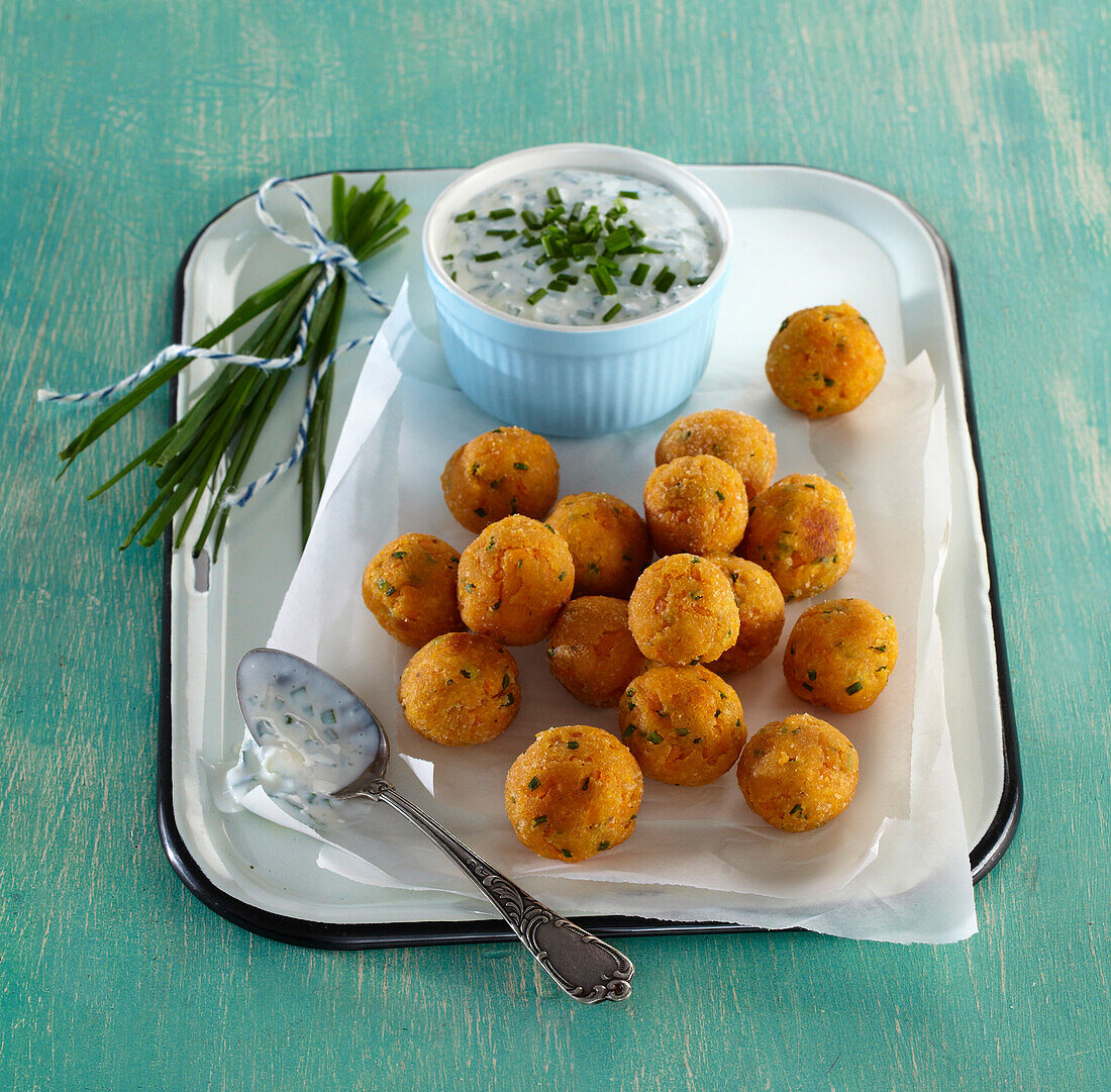 Homemade sweet potato croquettes with garlic dip