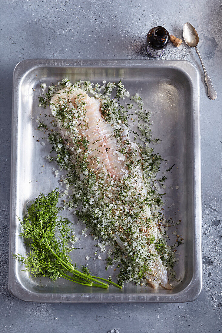 In gin marinated codfish with white pepper and dill