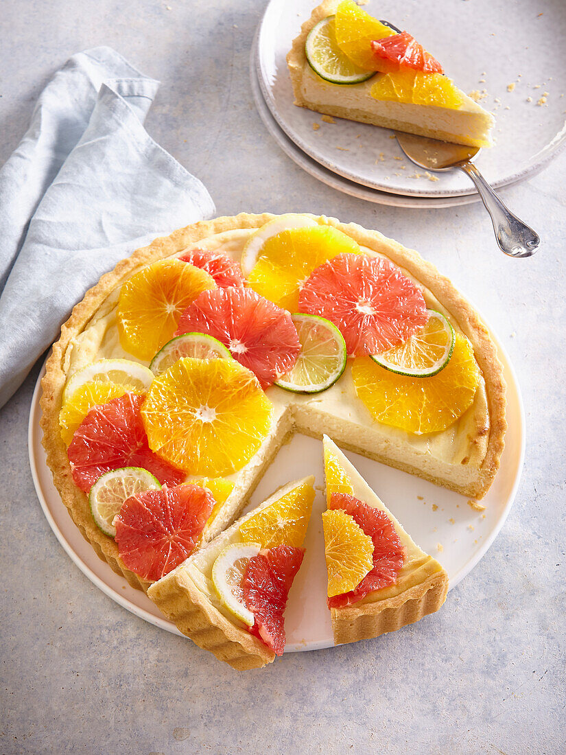 Käsekuchen mit Orangen und Grapefruit