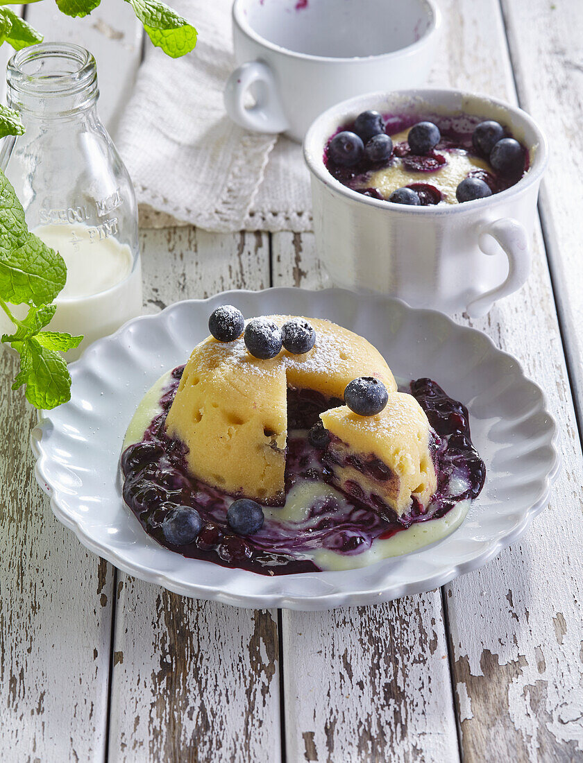 Cup dumplings with blueberries and vanilla sauce