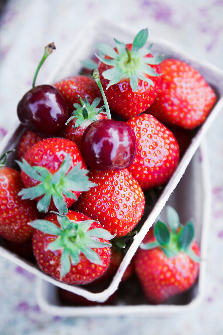 Fresh strawberries and cherries