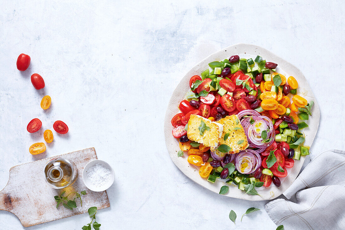 Tomato Greek salad with pan-fried feta