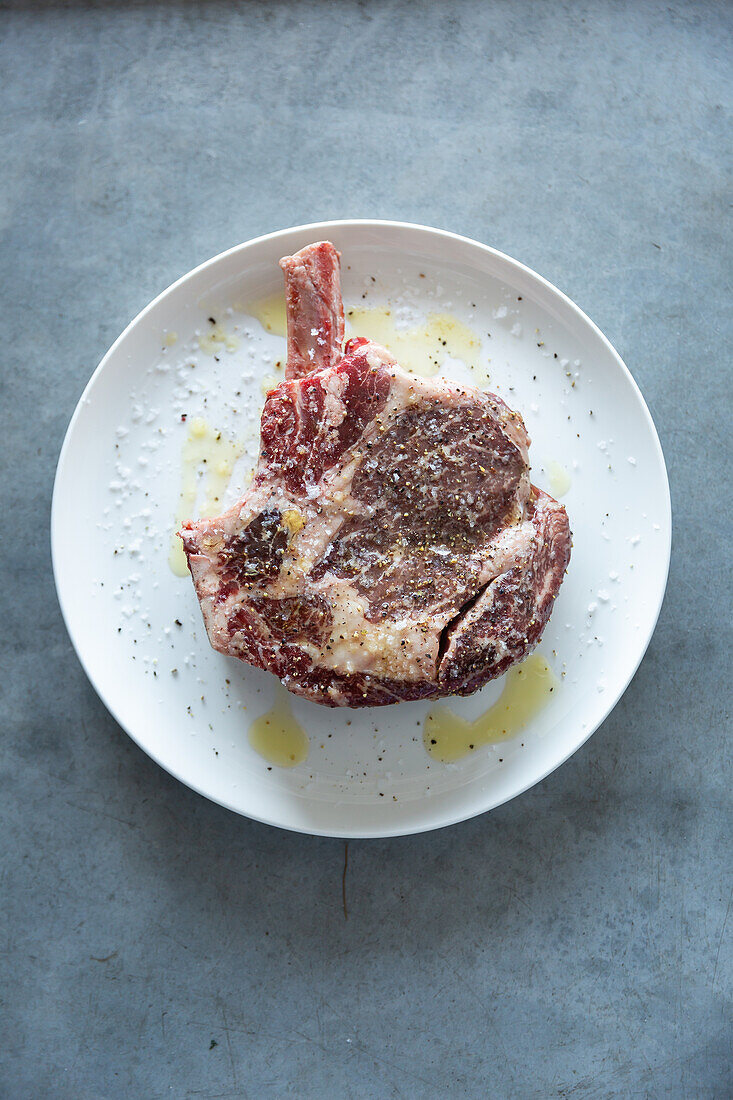 Raw ribeye with spices