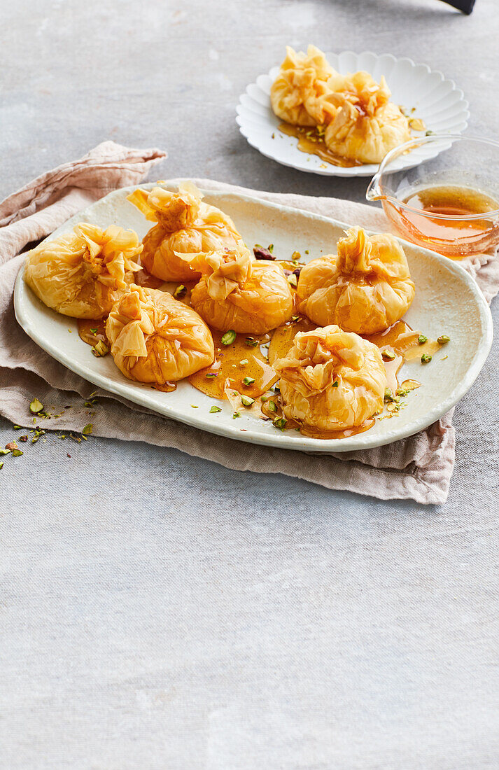 Semolina custard dumplings with spiced honey syrup