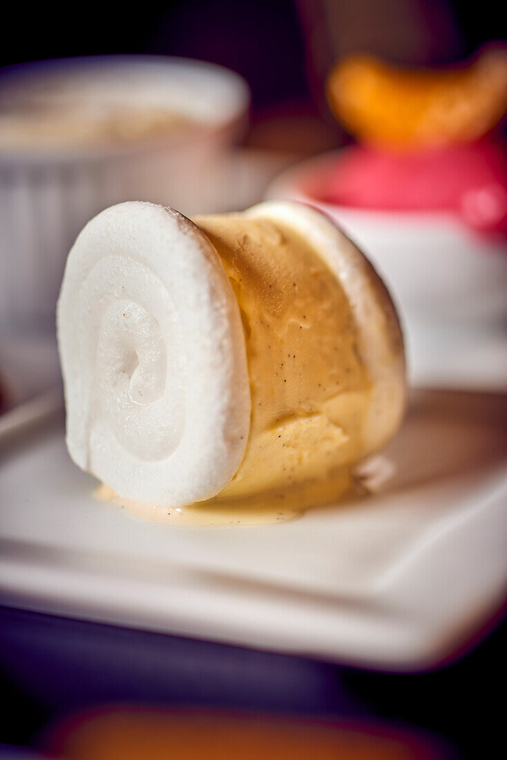 A meringue filled with vanilla ice cream