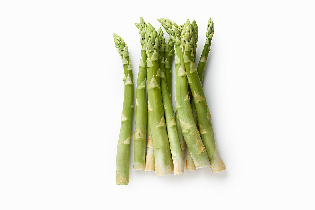 Fresh green asparagus isolated on white background